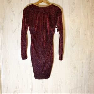 Beautiful glitter long sleeve low swoop back dress